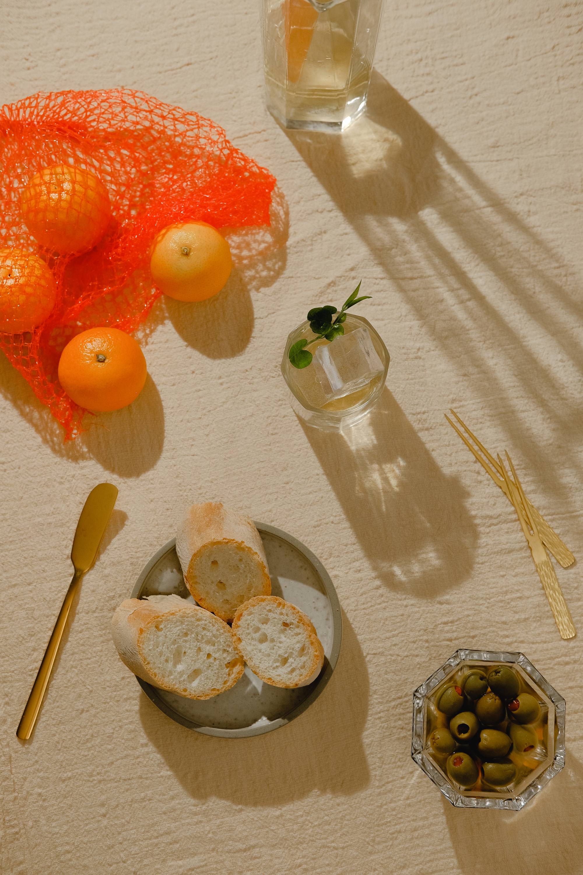 Top View of Drinks, Fruits, Bread and Olives